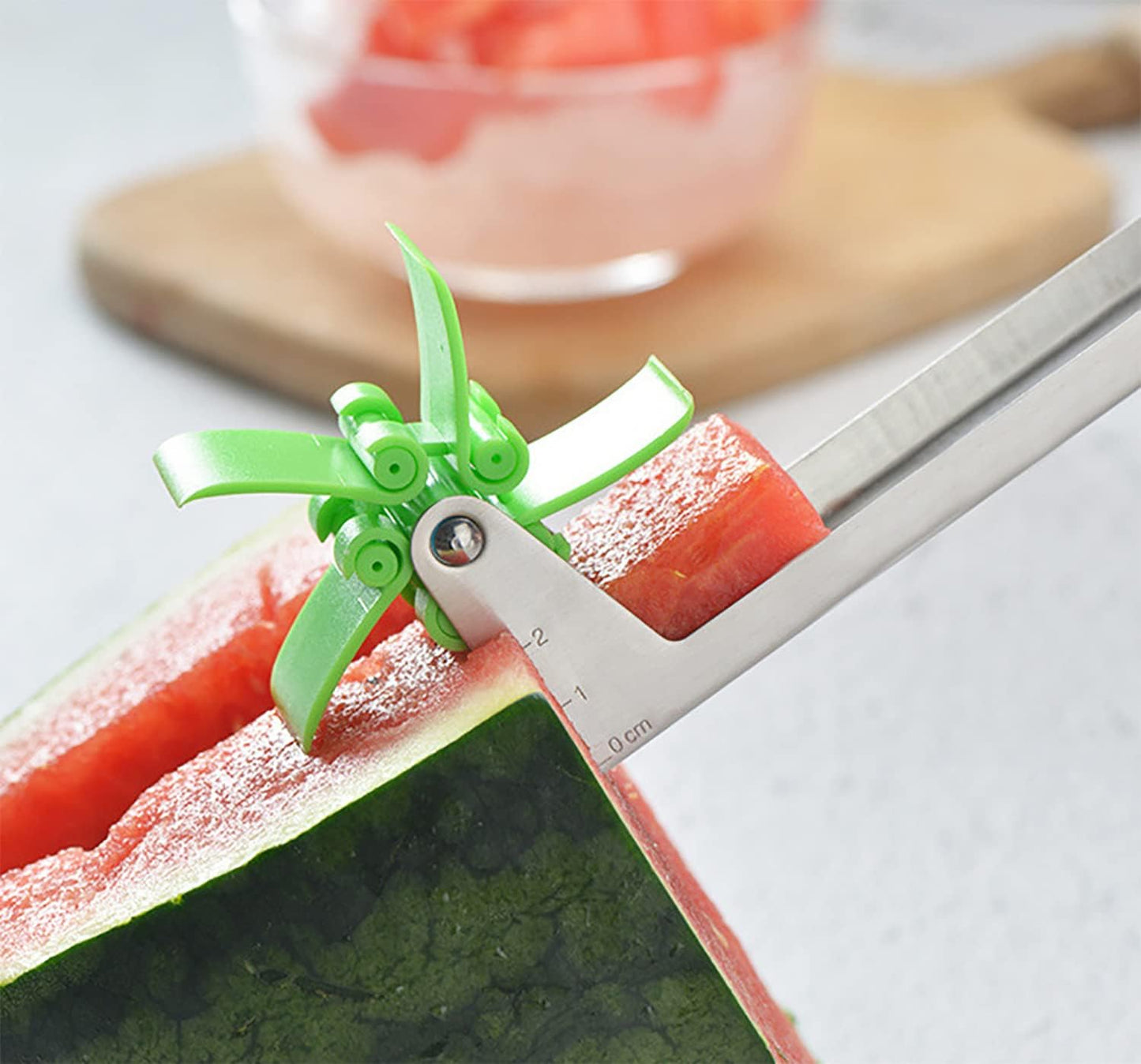 "Windmill-Shaped Watermelon Cutter: Plastic Slicer for Effortless Watermelon Cutting and Power Saving"