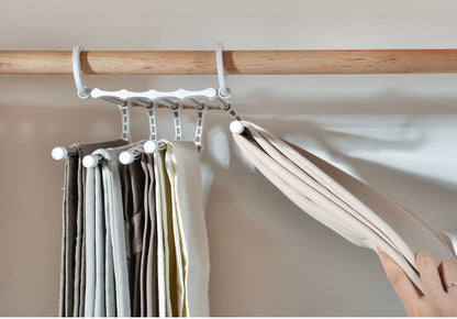Keep Your Pants Safe and Stable with 5 in 1 Magic Trouser Rack Hangers.